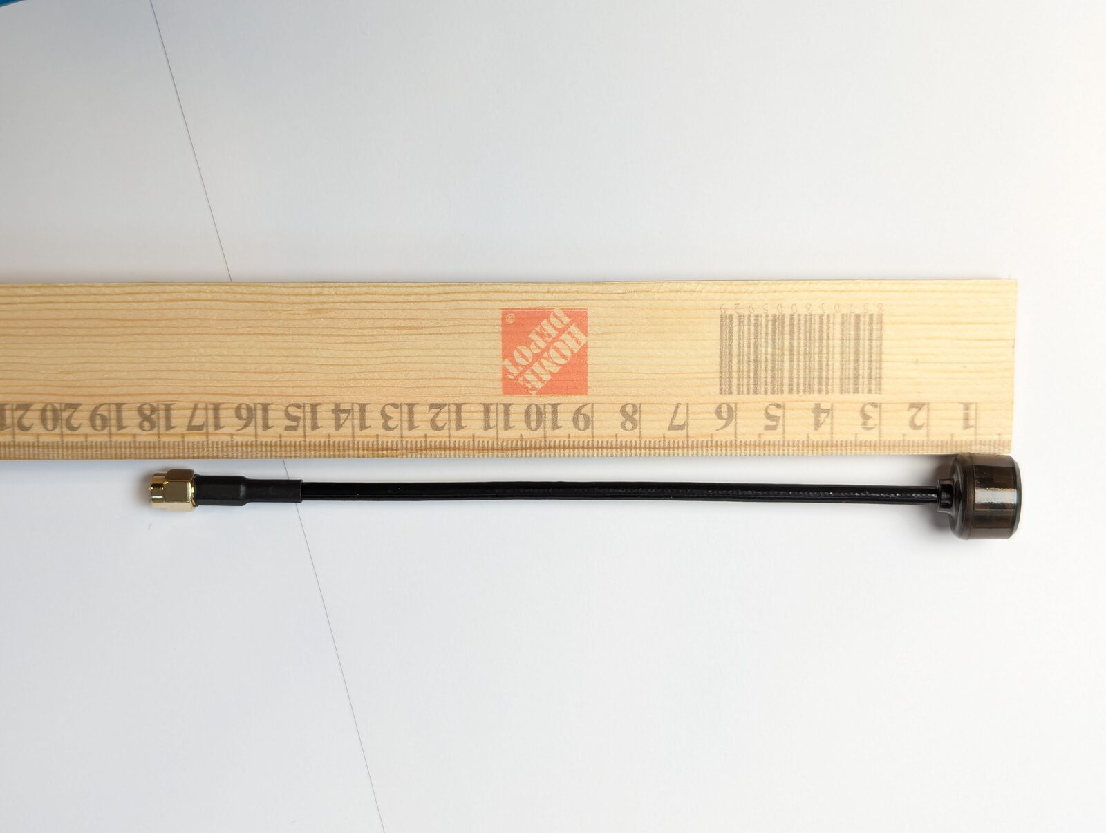 A5800 overall length check against a ruler — 178mm from SMA connector to radome tip