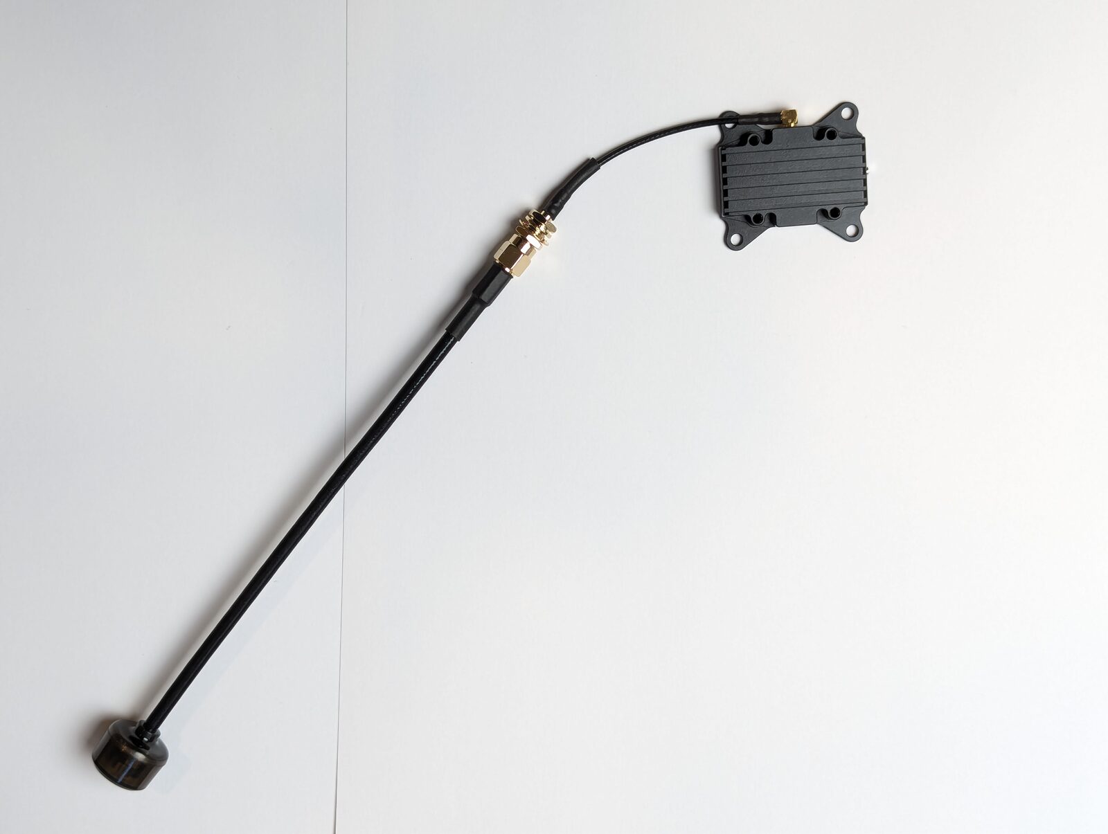 Robofusion A5800 antenna mounted on the VT5804 video transmitter via the included MMCX-to-RPSMA extension feeder